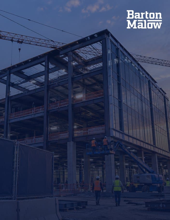 Ironworkers on a steel frame under construction